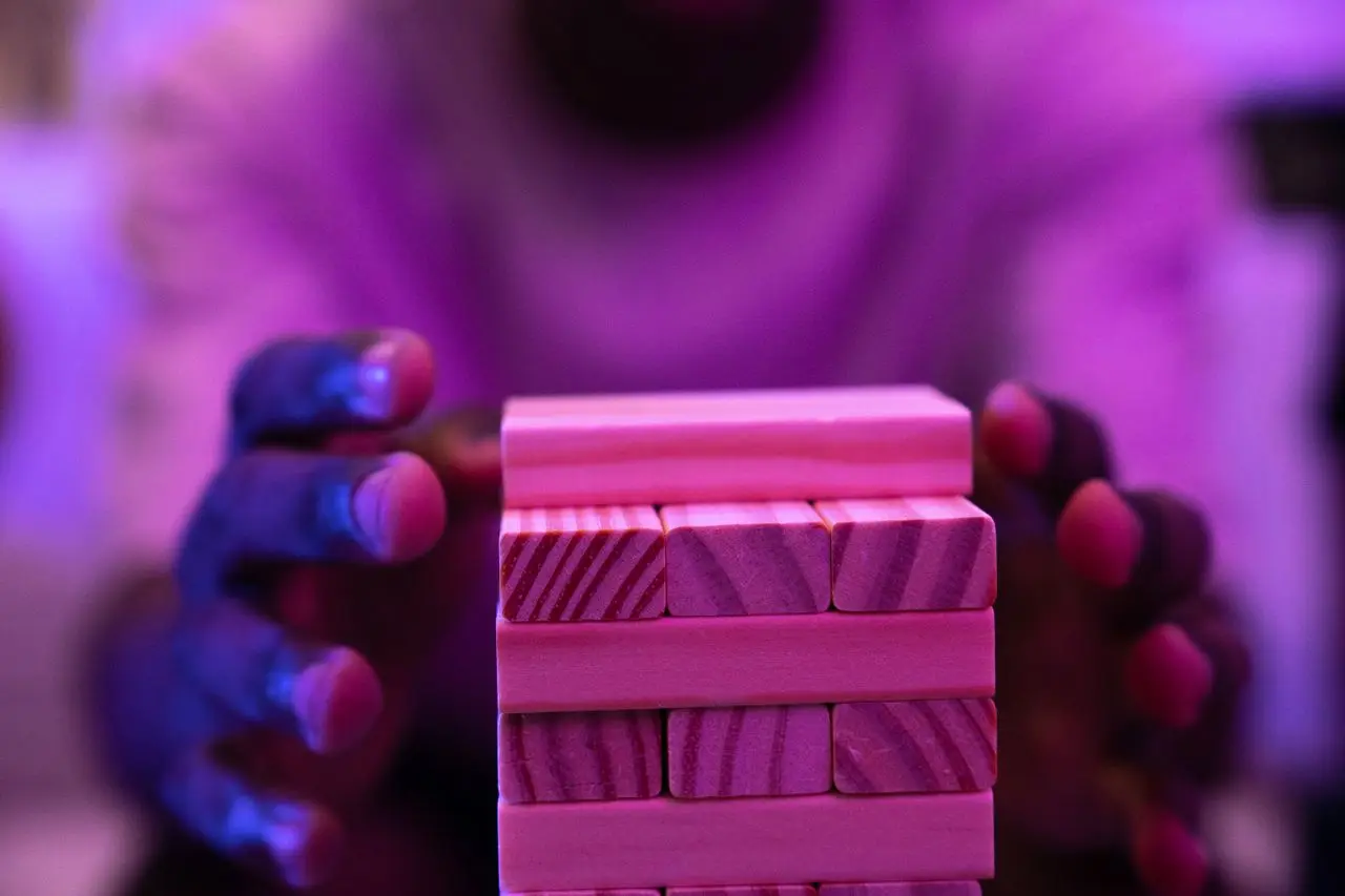 A man playing jenga